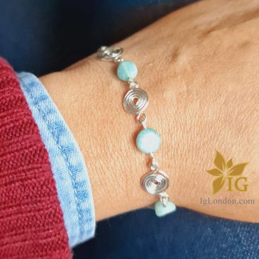 Spiral bracelet with amazonite crystal and silver, presented in a gift box.