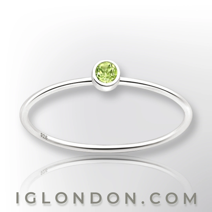 Solitaire ring Solitaire birthstone ring crafted in sterling silver .