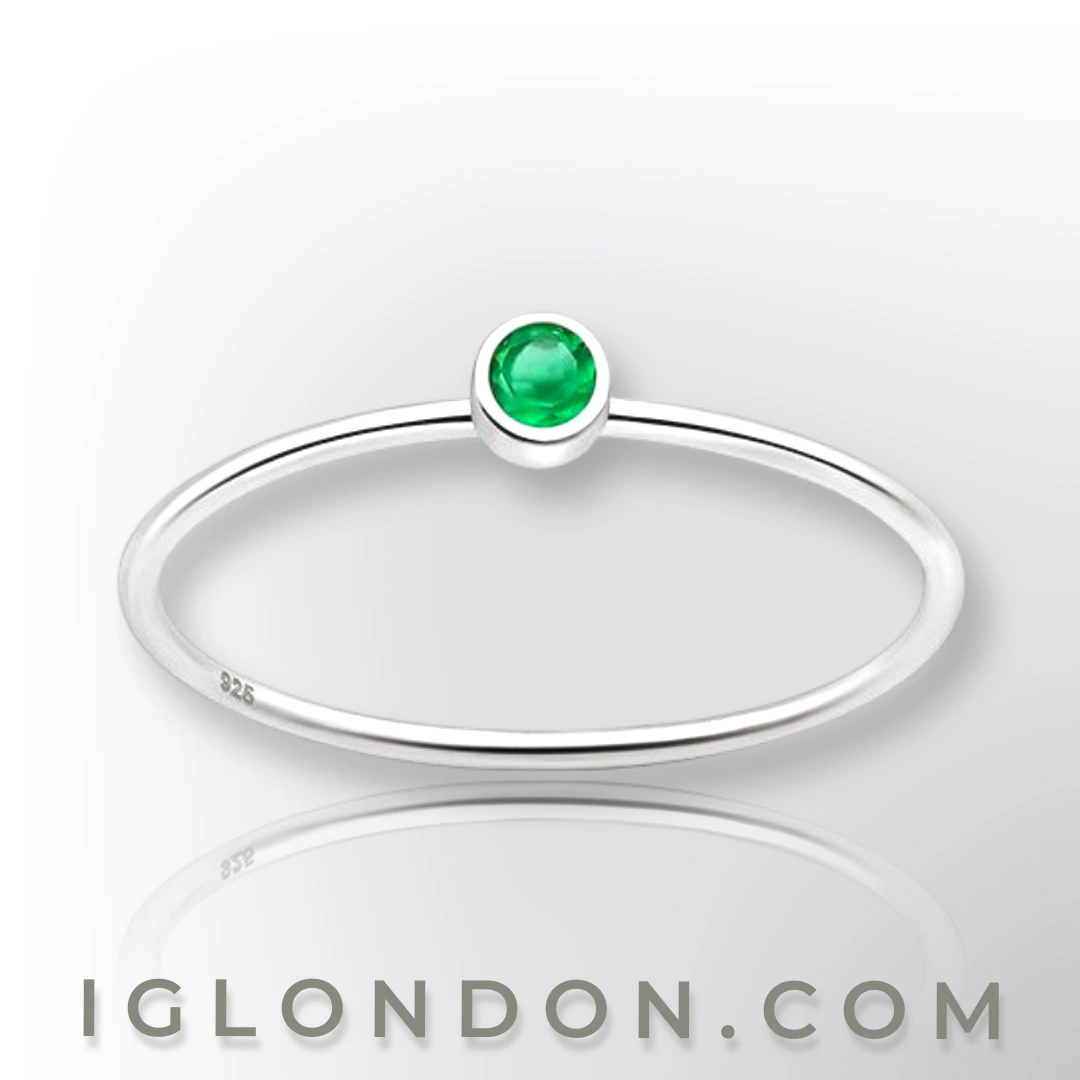Solitaire ring Solitaire birthstone ring crafted in sterling silver .